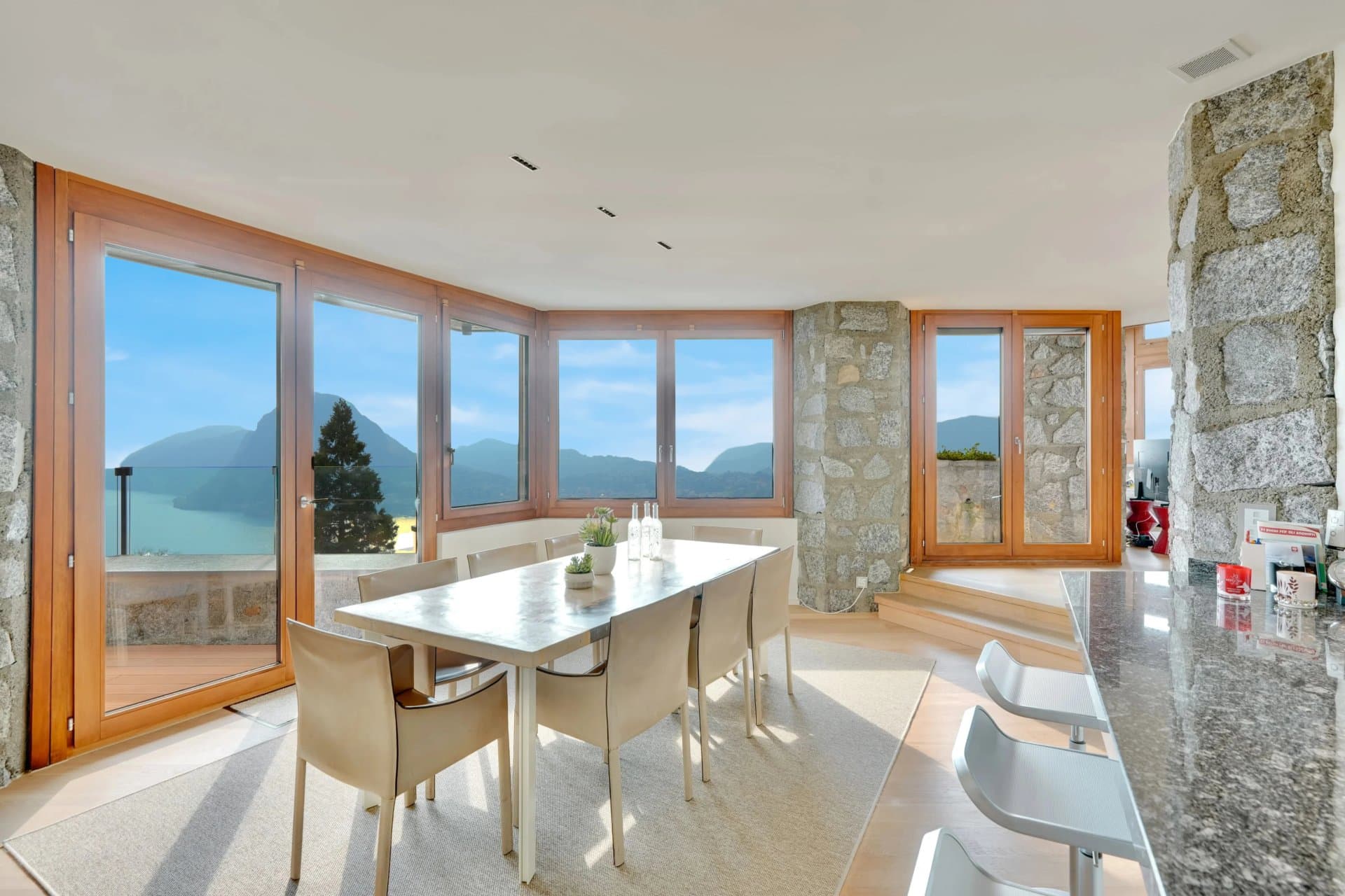Completely refurbished, this extraordinary villa for sale in Lugano-Aldesago, designed by architect Franco Ponti, stands out for its iconic triangular forms and the refined interplay of natural stone… - 4