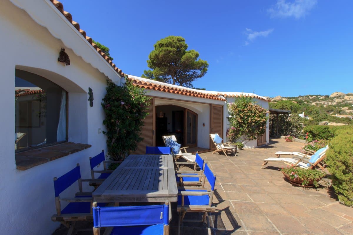 Villa Confinante Mare is an exclusive waterfront rental residence in Porto Rafael, harmoniously nestled among granite rock formations and Mediterranean scrub. - 3