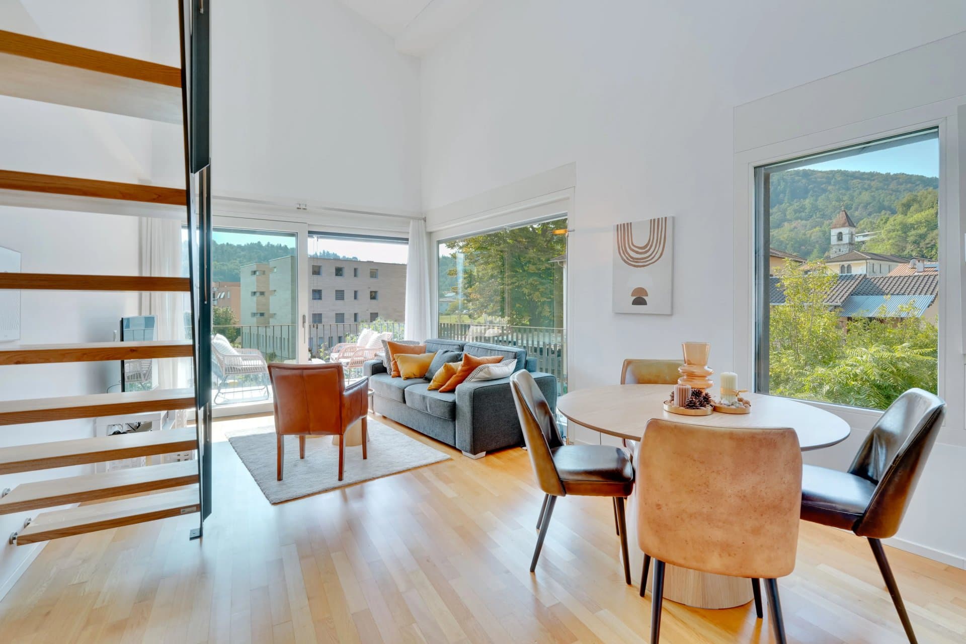 This modern duplex apartment, with a beautiful, covered terrace and secondary residence status, is for sale in Losone, in a peaceful residential area within a building with only a few units. - 3