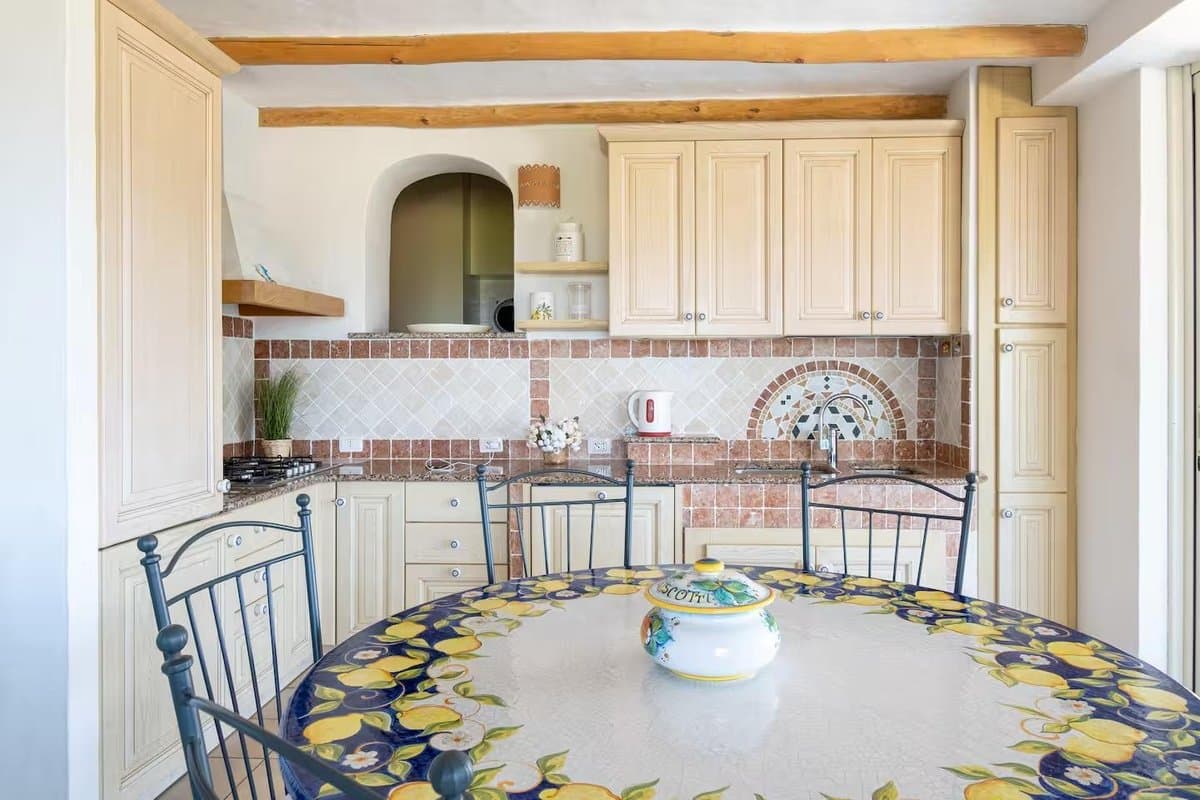 Villa delle Vigne is a private detached residence available for rent in the hills near Baja Sardinia, commanding views over the bay of Cala Bitta. - 3